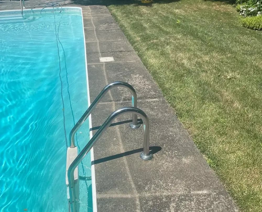 Before — Concrete pressure washing before and after in Grimsby