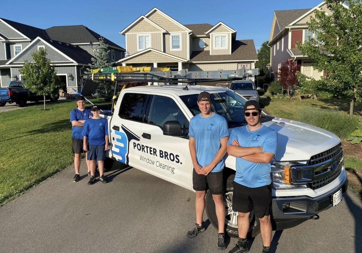 Porter Bros team standing Infront of their work truck