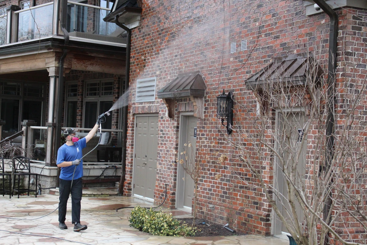 Soft wash cleaning service performed on a house